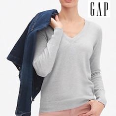 Gap Women's V-Neck Pullover Soft Knit Light Sweater Top In Grey Straight Silhouette With An Easy Fit. Hits Below The Hips. Soft Knit. Long Sleeves With Rubbed Cuffs, Hem. Ribbed V-Neck. #931205 100% Cotton. Machine Wash. Armpit To Armpit Xs: 18.5"; S: 19" Total Length Xs; 24"; S: 24.5" Gap V-neck Tops For Fall, Gap Sweater For Spring Layering, Casual Gap V-neck Sweater, Casual V-neck Sweater By Gap, Gap V-neck Fall Sweater, Long Sleeve Tops By Gap, Classic Winter Tops From Gap, Gap Long Sleeve Knit Tops, Gap Knit Tops For Winter