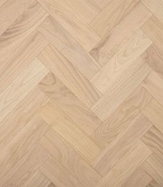 an image of wood flooring that looks like it is made out of herringbones