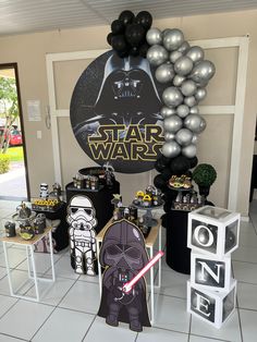 a star wars party with balloons and decorations