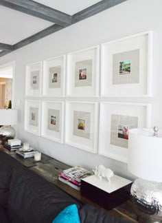 a living room with pictures on the wall and an instagramr for pinter