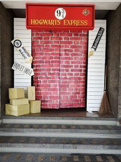 the entrance to hogwart's express is painted red and white with black lettering