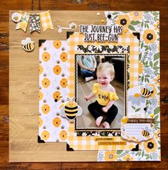 a scrapbook page with a baby holding a bee