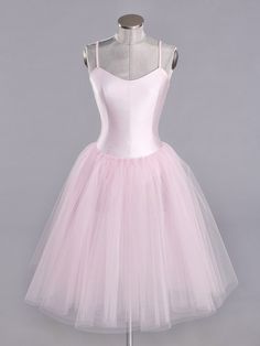 a pink tulle skirted dress on a mannequin