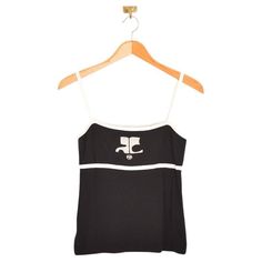 Chic Vintage Courrèges knitted vest top in a black & white monochromatic colour way with slim shoulder straps and Iconic Logo detailing. Features; Timeless Design Courreges 21 Japanese licensed label Stretchy Knitted material Sizing; Pit to Pit; 15'' - 18'' Top of shoulder to Hem; 20'' Recommended Size; UK 8-12 Vintage Courreges, Monochromatic Colour, Andre Courreges, Cristobal Balenciaga, Contrast Top, Knitted Vest, Models Off Duty, Chic Vintage, Harper's Bazaar