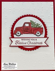 a red truck with a christmas tree on it's back and the words wishing you a festive christmas