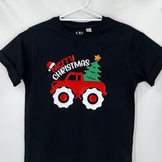 Boy Christmas Truck Tee  Kids Unisex printed T-Shirts, Every tee is made to order. To ensure longevity of your shirt, Wash inside out and please don't iron directly on the print, iron inside out or a great tip is to hang straight on a coat hanger and hang to dry inside. SIZING: The Kids Youth t-shirts are made with 100% premium combed cotton and are a unisex t-shirt. Make sure to take a peak at the size chart to get a good description of the size so we can get the best fit for the kids. These measurements are half chest measurements, so keep that in mind when looking at the chart. Kids Youth T-Shirts are ordered as per the item is bought, so a longer delivery time may occur. I will endeavour to have them out to you within 7 to 10 days of your purchase date. Of course if I receive them earl Shirt For Boys, Women Motivation, Christmas Truck, Printed T Shirts, Boys Christmas, Coat Hanger, Kids Tops, Christmas Shirt, Combed Cotton