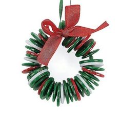 a christmas wreath with red, white and green decorations