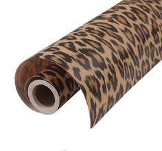 a roll of brown and black animal print paper