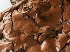 a close up view of chocolate cookies with icing on them