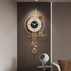 a clock on the wall next to a table with a lamp in front of it