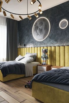 two beds in a bedroom with yellow headboards