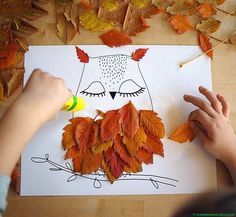 a child is drawing an owl with leaves