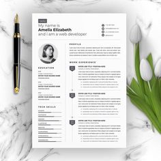 a professional resume template with flowers and pen on the table, next to it is an image