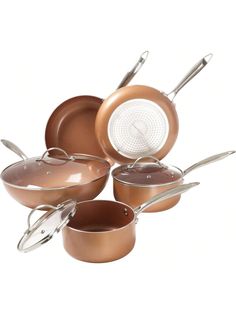 an assortment of pots and pans on a white background with the lid open to show it's copper color