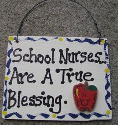 a sign that says school nurses are a true blessing on the sidewalk with an apple