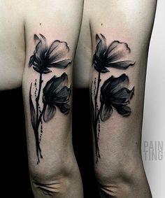 two black and white flowers on both legs