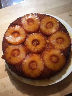 a pineapple upside down cake on a white plate