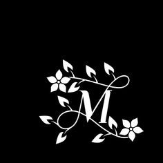 the letter m is made up of leaves and vines with an elegant monogramic design