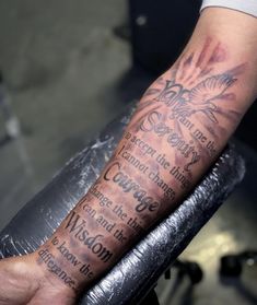 a person with a tattoo on their arm