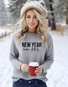 Get ready to welcome the new year with the perfect blend of sass and style with our NEW YEAR Same B*tch Crewneck. Crafted for women who love to wear their attitude on their sleeves, this crewneck is a must-have addition to your wardrobe. Comfortable and cozy, this crewneck is perfect for all seasons. The classic crew neckline adds a touch of elegance to your look while keeping it casual and relaxed. The phrase "New Year Same B*tch" emblazoned on the front makes it perfect for gifting your bestie Cricut Sweatshirt Ideas Women, Popular Sweatshirts, Mama Accessories, Mommy Clothes, Christmas Fashion Outfits, Tshirt Svg, Sweater Ideas, Mommy Outfits, Tee Designs