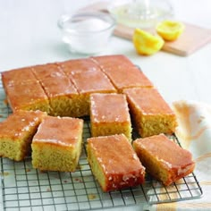 several pieces of cake sitting on a cooling rack