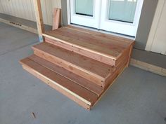 the steps are made out of wood and ready to be built into the front door