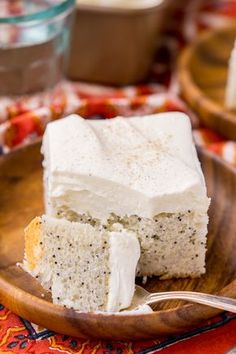 a piece of cake on a wooden plate