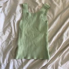 New Unworn Green Brandy Melville Knit Tank. Bought It But Ended Up Not Liking It And By The Time We Returned It It Was Too Late. Cute With Black Bottoms. Green Soft Knit Crew Neck Top, Green Soft Knit Cotton Top, Green Soft Knit Top, Soft Knit Green Knit Top, Trendy Green Knit Tank Top, Green Textured Knit Top, Green Knit Tank Top For Fall, Green Sleeveless Knit Top, Green Knit Tops For Loungewear