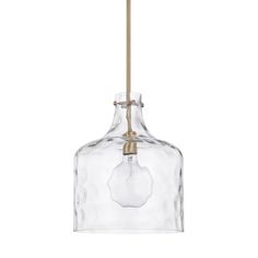 a clear glass light fixture with a brass finish