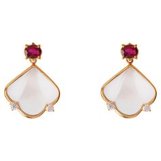 Rossella Ugolini Design Collection, Deco Style 18 Karats Yellow Gold Oval Cut Rubelite, Rock Crystal, 0.12 Carats White Diamonds Dangle Earrings. Dimension: inches 0.39 x 6.29. cm. 1x1.6. gr 4. These Art Deco style dangle earrings are a stunning piece of jewelry from the Rossella Ugolini collection. Handcrafted in Italy, these earrings are made from 18k yellow gold and feature a beautiful combination of Rubelite, white Diamonds, and Rock Crystal. The frosted fan shape of the earrings gives them a unique, eye-catching look that is sure to turn heads. The Art Deco style is characterized by its bold, geometric designs and clean lines, making these earrings a timeless piece of jewelry that will never go out of style. The use of precious materials such as 18k yellow gold, Rubelite, White Diamon Crystal Dangle Earrings, Style Deco, Estilo Art Deco, Rock Crystal, Pendant Set, Geometric Designs, High Quality Jewelry, San Valentino, Art Deco Fashion