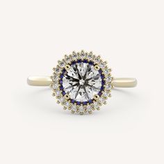 a diamond and blue sapphire halo ring