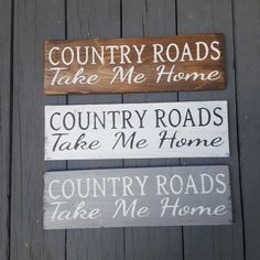 three wooden signs that say country roads and take me home