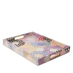 a multicolored patchwork tray with handles