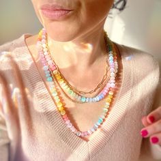 This necklace was designed for lovers of blushing shades of pink and peach! This rainbow is heavy on the pink, but also includes lilac, baby blue and sunshiney yellow. This necklace is made of natural Quartz that's been expertly treated to create the hue and saturation of some of the most popular gems.  There are also Cat's Eye Selenite and Pearls! (Questions? See Gem Geek™ notes below.) Your Wearable Rainbow is made with scrupulously selected 8mm beads, hand-dyed silk cording, and 14/20 Gold-Fill Findings.  . Each necklace is knotted on premium-quality silk thread. I dye all cord myself in micro batches to control quality. I use a proprietary dye process that gives color-fast, vibrant colors and enhanced silk durability. Please read the full description for details on care and keeping. . Rainbow Necklaces, Gem Candy, Easy Beading, Fairycore Fashion, Goth Gifts, Pastel Jewelry, Supplements Packaging, Candy Jewelry, Rainbow Gemstones