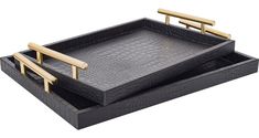 two black trays with gold handles on each side and one holding a wooden handle