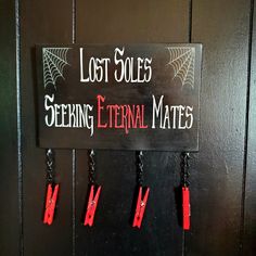 a sign hanging on the side of a door that says, lost soles seeing external mates