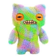 a multicolored stuffed animal with big eyes and teeth on it's face