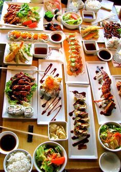 a table topped with lots of different types of food