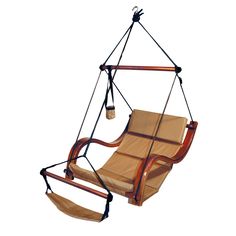 a hanging chair made out of wood and fabric