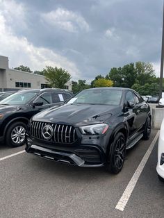 several cars are parked in a parking lot