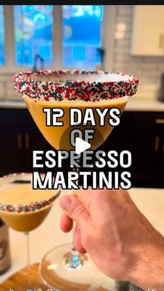 someone is holding up a martini glass with sprinkles on it and the words 12 days of espresso martinis