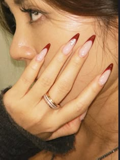 gel x nail design, french tip nail design, red nail theory Unique Red French Tip Nails, Christmas Red French Tip Nails Almond, Red French Bow Nails, Red French Tip Design Nails, Deep Red Nails French Tip, Cherry Cola French Tip Nails, Red Tip Almond Shaped Nails, Red Ombre French Tip Nails, Red On Red French Tip Nails