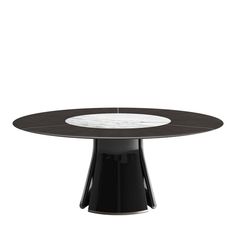 a black and white dining table with an oval marble top, on a pedestal base