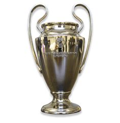 a shiny silver trophy sitting on top of a table