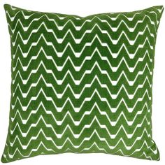 a green pillow with white chevrons on the front and back, sitting on a white background