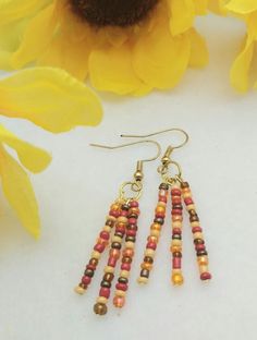 Tasha ER054, Pretty Earrings with Fall Color Glass Seed Bead Dangles. Makes a Unique Fall Gift or Something Special for Yourself! Every Woman Deserves to Sparkle! Seed Bead Earrings Fall, Fall Earrings Diy Beads, Fall Handmade Jewelry, Fall Earring Ideas, Fall Earrings Beaded, Diy Fall Jewelry, Fall Seed Bead Earrings, Fall Seed Bead Jewelry, Fall Jewelry Diy