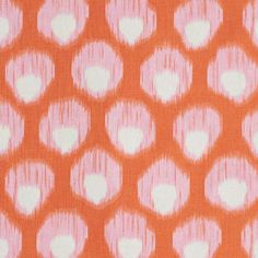 an orange and white polka dot print fabric