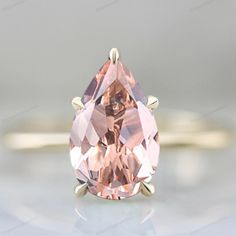 Pear Cut Morganite Anniversary Rig 14K Yellow Gold Wedding Ring Promise Ring for Woman Anniversary Gift of Her Pear Engagement Ring Main Stone:Morganite  Main Stone Color :Pink  Main Stone Shape : Pear  Jewelry Type: Ring Metal: Silver Method: Cast Personalization: Possible Style: Chevron This elegant ring is perfect for any occasion like a party, wedding, engagement, etc. as it suits any outfit or with many emotions to express. Rhodium choice:- you can choose rose gold, Yellow Gold, Silver We only do nickel-free Rhodium which is friendly to the skin, We have all kinds of precious, semi-precious stones and Diamonds. We believe in quality products and thus we try to deliver the best to our customers. Our products are of excellent proportion and have high clarity in terms of material and dur Pear Engagement Ring Morganite, Pear Jewelry, Yellow Gold Wedding Ring, Pear Engagement Ring, Gold Wedding Ring, Morganite Engagement Ring, Ring Metal, Ring Promise, Elegant Ring