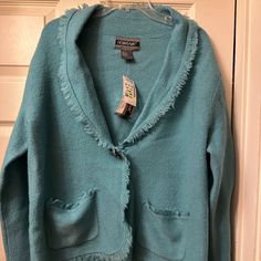 This Is A Unique Periwinkle Blue Coat That Has Never Been Worn. It Is Fairly Light So Not The Best Choice For A Snow Storm But It's Great For Autumn And The Beginning Of Winter. It Has An Adorned Button In The Front. It Is 28 Inches In Length, The Sleeves Are 22 Inches In Length, And Pit To Pit Is 21 Inches. Please Reach Out With Any Questions. Cozy Blue Soft Knit Outerwear, Periwinkle Cardigan, 90s Patchwork Blue Outerwear, Light Blue Single-breasted Long Sleeve Outerwear, Vintage Blue Pre-washed Outerwear, Light Coat, Blue Coats, Periwinkle Blue, Light Blue