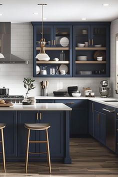 a kitchen with dark blue cabinets and white counter tops, wooden flooring and stools